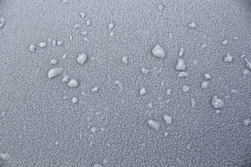 Snow patterns on the surface of the machine in light colors