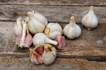 Fresh garlic on a rustic wooden table