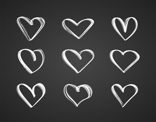 Vector Black outline Hand drawn set of hearts on chalkboard background.