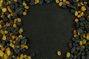 Dried raisins on white background