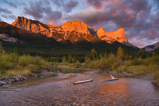 Sunrise and Alpenglow on Mount Lawrence Grassi and Ha Ling Peak in autumn, Canmore, Alberta, Canadian Rockies, Canada