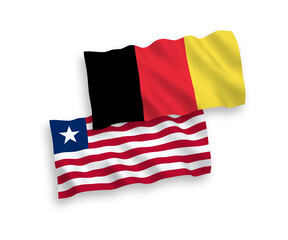 National vector fabric wave flags of Liberia and Belgium isolated on white background. 1 to 2 proportion.
