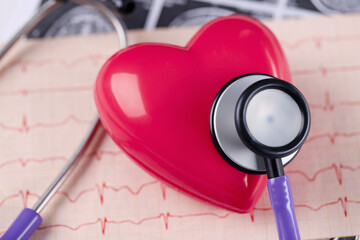On table lies cardiogram heart and stethoscope