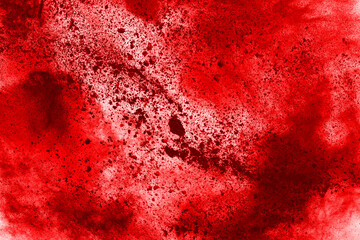 Freeze motion of red powder exploding, isolated on white background. Abstract design of red dust cloud. Particles explosion screen saver, wallpaper