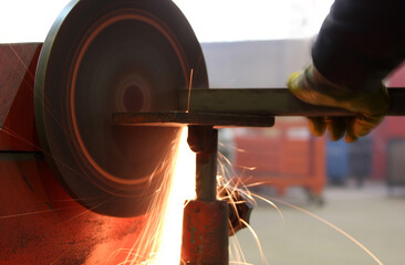 Grinding machine in the factory. Heavy industry. Industrial background.