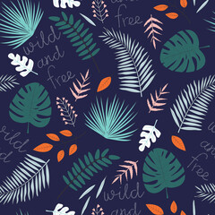 Fototapeta na wymiar Vector seamless pattern with tropical leaves and inscription Wild and Free on dark background. For wallpapers, decoration, invitation, fabric, textile and print, gift and wrapping paper.