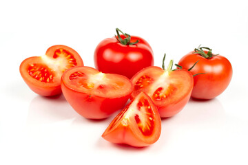 several large red tomatoes close-up on a white background