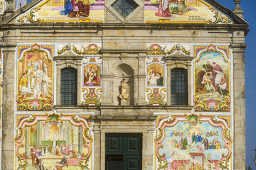 Fototapeta na wymiar facade covered with azulejos of the Nossa Senhora do Amparo Church located in Valega, district of Aveiro, Portugal