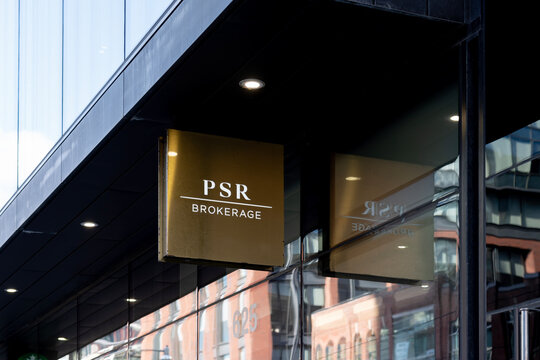 Toronto, Canada - November 28, 2020: PSR Brokerage company sign on the building  in Toronto. PSR is Toronto's premier full-service brokerage, specializing in every facet of real estate. 