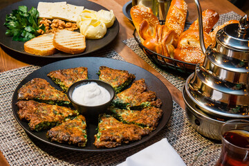 Appetizing breakfast dish made of cheese and herbs