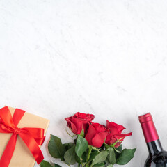 Top view of Valentine day gift with rose and wine, festive meal design concept