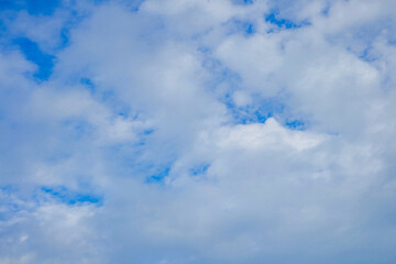 Beautiful blue sky with clouds on bright  sunny day