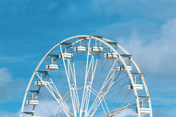 ferris wheel on blue sky background