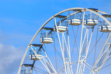 ferris wheel on blue sky background