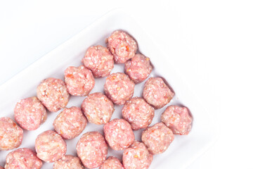 raw meat balls isolated on white