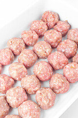 raw meat balls isolated on white