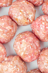 raw meat balls isolated on white