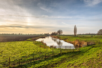 Picturesque Dutch landscape at the end of a sunny winter day. The photo was taken in the polder...