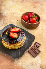 front view sweet pancakes with fruits on a wooden desk dessert sweet cake pie