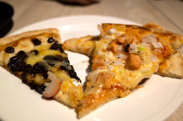 eat a piece of pizza