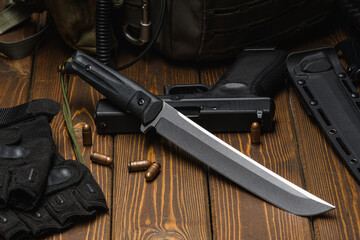 combat knife and military ammunition.