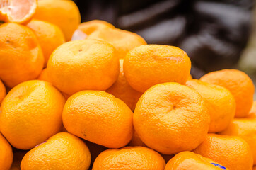 Ripe mandarins on display for sale 