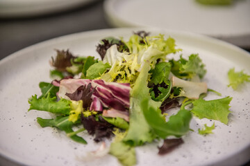 Vegetable accompaniment on white plate