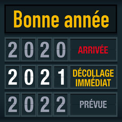 Fototapeta premium Carte de vœux 2021 avec un message décalé, montrant un tableau d’affichage d’aéroport pour illustrer le passage dans la nouvelle année.