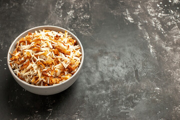 front view cooked rice inside plate on dark background dark dish east meal food