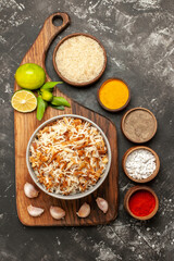 top view cooked rice with seasonings on dark floor meal dark dish east food