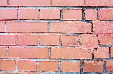 Obraz premium Masonry background with face on the wall