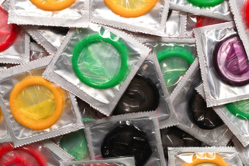 Colorful condoms background.