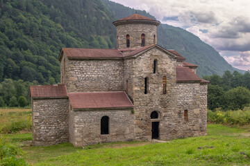Fototapeta na wymiar Middle temple. Ancient Christian Church of Alanya in the Caucasus Mountains. Russia, Karachay-Cherkessia, Arkhyz.