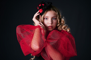 retro portrait of a beautiful girl in a red dress