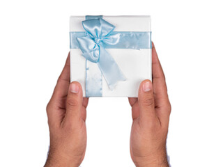 person holding a white gift box with sky blue ribbon on isolated white background