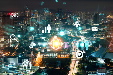 Fototapeta na wymiar Research and technological development glowing icons. Night panoramic city view of Kuala Lumpur. Concept of innovative activities expanding new services or products in Malaysia, Asia. Double exposure.