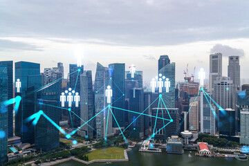 Social media icons hologram over panorama city view of Singapore, Asia. The concept of people networking and connections. Double exposure.