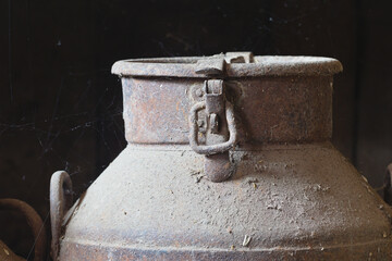 vintage old metal cans on a dark background