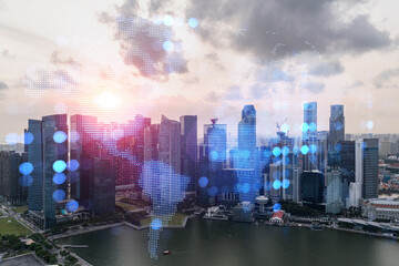 Glowing hologram of Earth planet map on aerial panoramic cityscape of Singapore at sunset, Asia. The concept of international business. Multi Exposure.