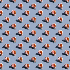 Seamless minimalistic seashell pattern on blue. Photo collage. Pop Art. Postcard. Printing on fabric. Wrapping.