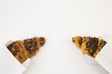 croissant with chocolate, free space in you text on white background