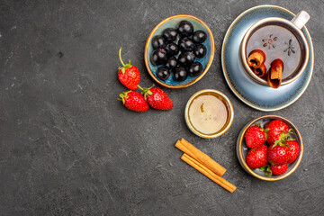 top view fresh red strawberries with tea and olives on dark background berry fresh fruit