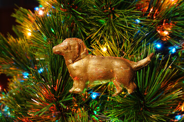 Golden dog. Vintage Christmas ornament. Antiques DRESDEN Cardboard.