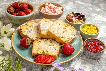 front view yummy cake slices with fruits on light background pie cake fruit sweet