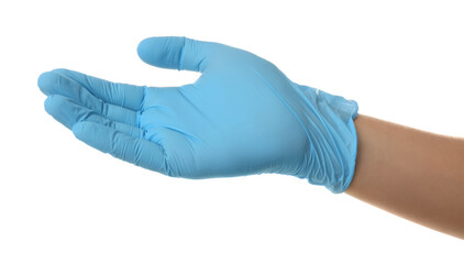 Person in blue latex gloves holding something against white background, closeup on hand