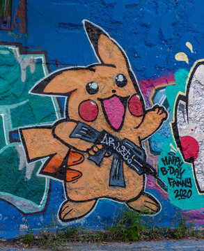 Ljubljana, Slovenia - August 21, 2020: A close-up picture of one of the graffiti on display at the Metelkova Art Center.