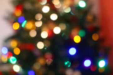 Colorful Christmas tree bokeh. Defocused Christmas background. 