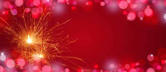 Burning sparklers on red background