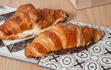 Croissants filled with sweet chocolate and white chocolate.