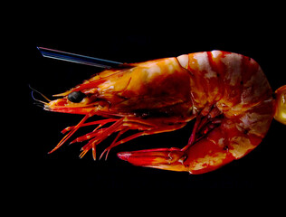 A delicious skewered grilled prawn